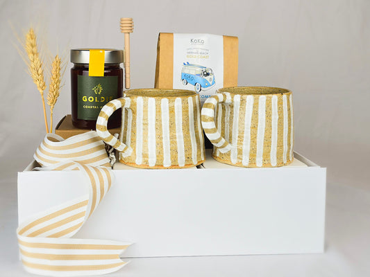 Gift hamper with 2 handmade ceramic mugs, Coffee beans and honey.