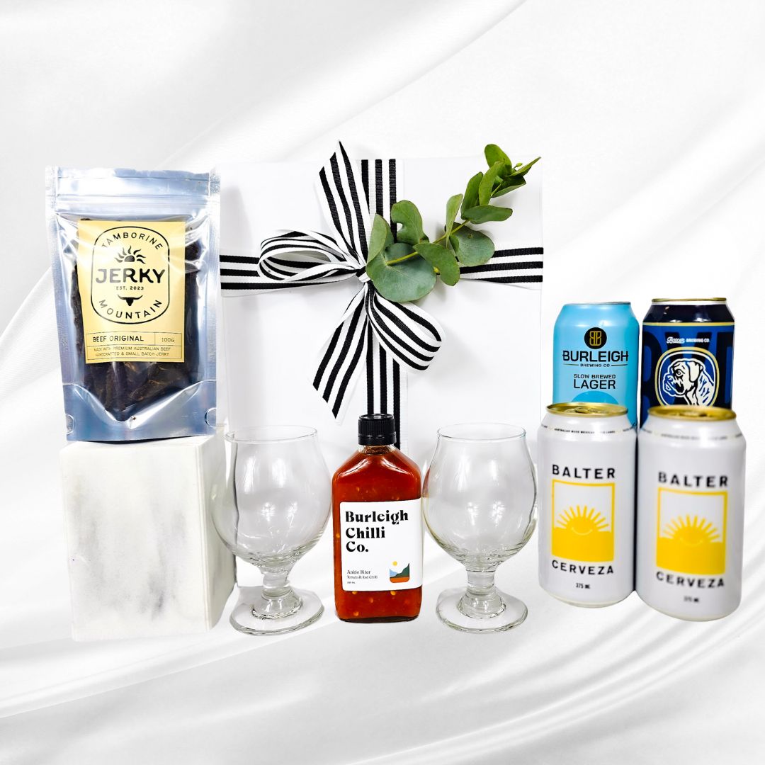 Gift hamper for men with beer, jerky and chilli sauce.